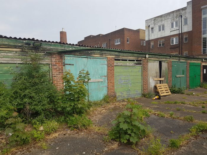 The garages are left to decay and ruin.